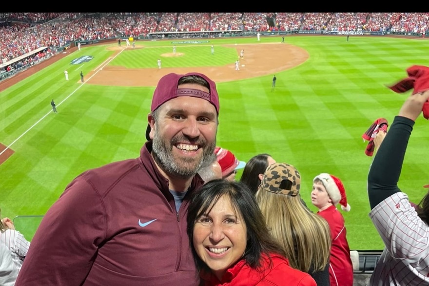 Greg Quinn and his mother Ruth Corcoran together in the stands at a Phillies postseason game